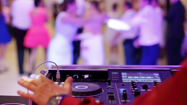 Setting the Mood: Unleashing the Magic of a Wedding DJ
